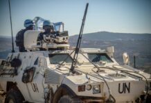 2009 թվականի հուլիսի 14-ի արարողությունը Հարավային Լիբանանի Աթ Թիրի քաղաքում `UNIFIL- ի ֆրանսիական զորախմբի ընկերակցությամբ: Լուսանկարը ՝ Libnanews.com, բոլոր իրավունքները պաշտպանված են: