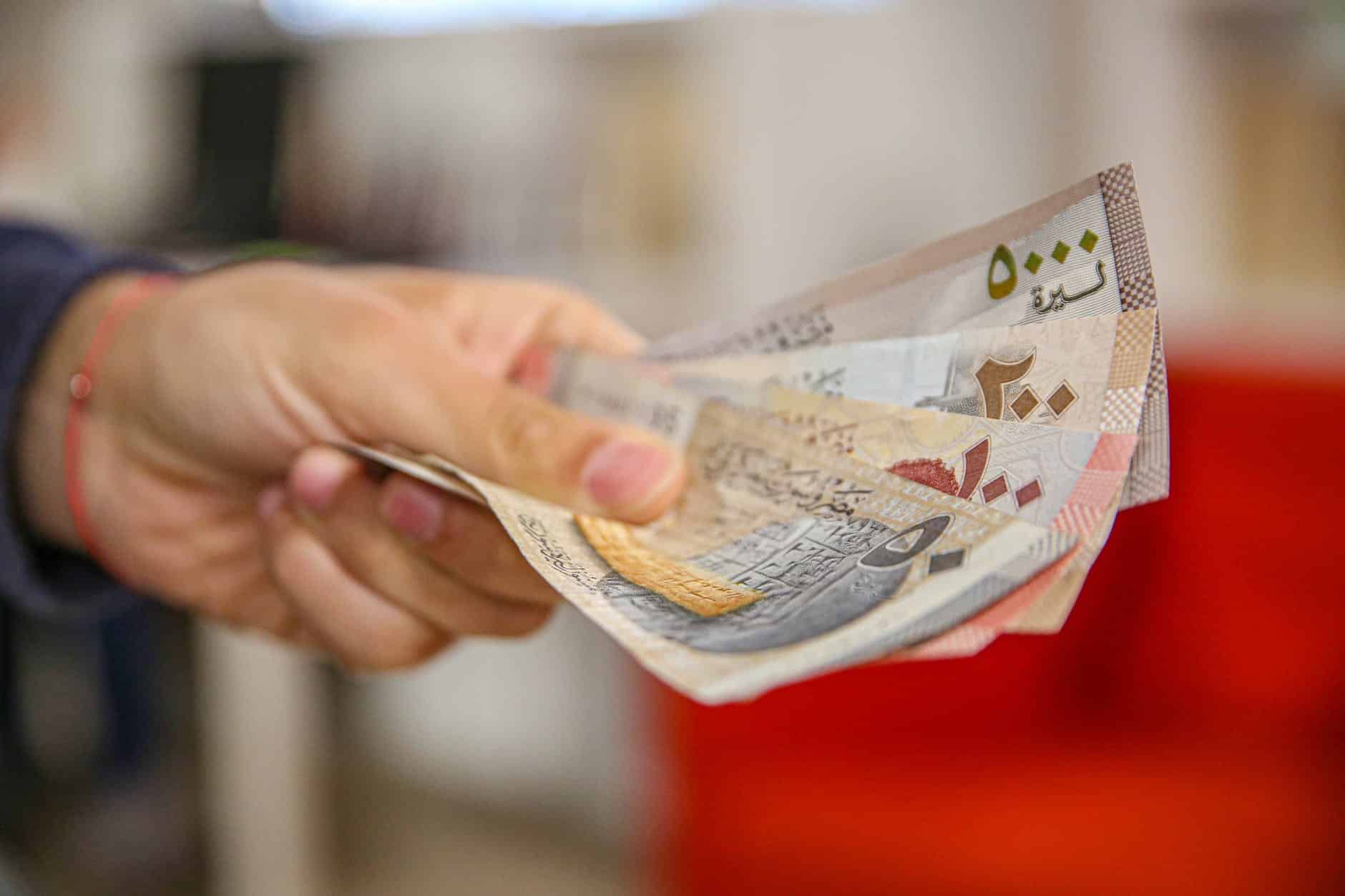 pexels-photo-11815552 syrian paper money