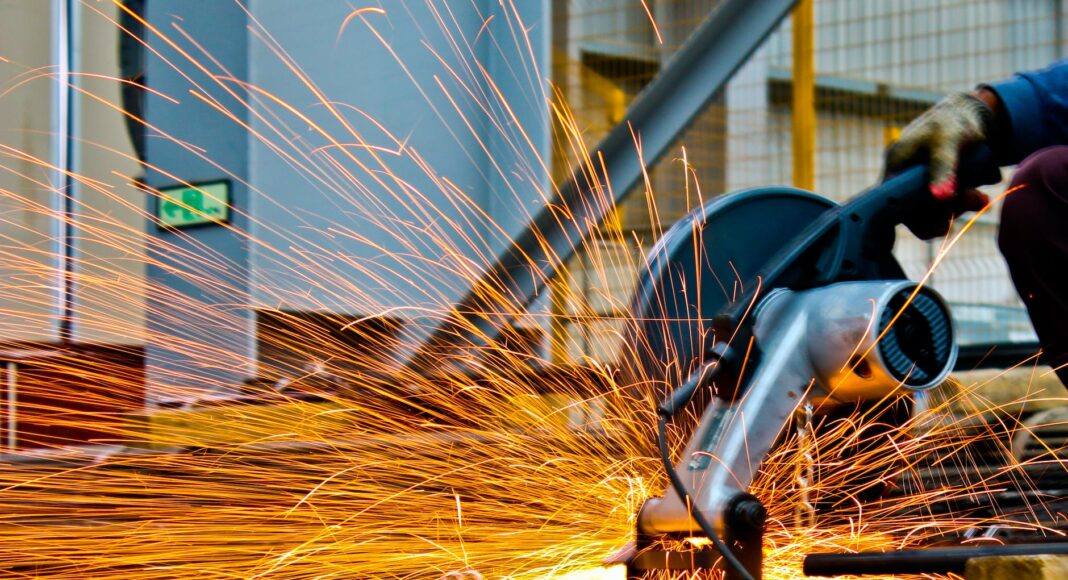 cut off saw cutting metal with sparks