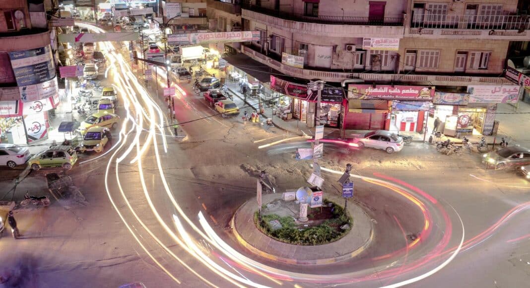 time lapse photography of cars on the road during night time