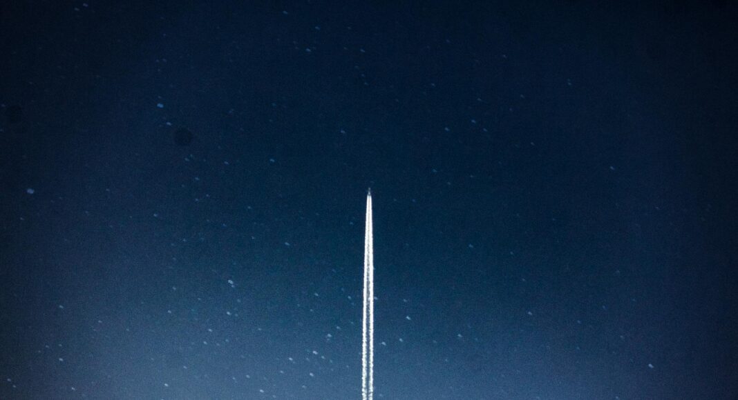 space shuttle launch during nighttime