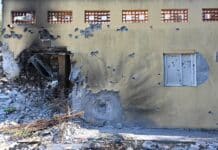 Kobi Gideon , Damaged building in the kibbutz Be'eri in Israel, following the October 7th massacre, Source Government Press Office of Israel