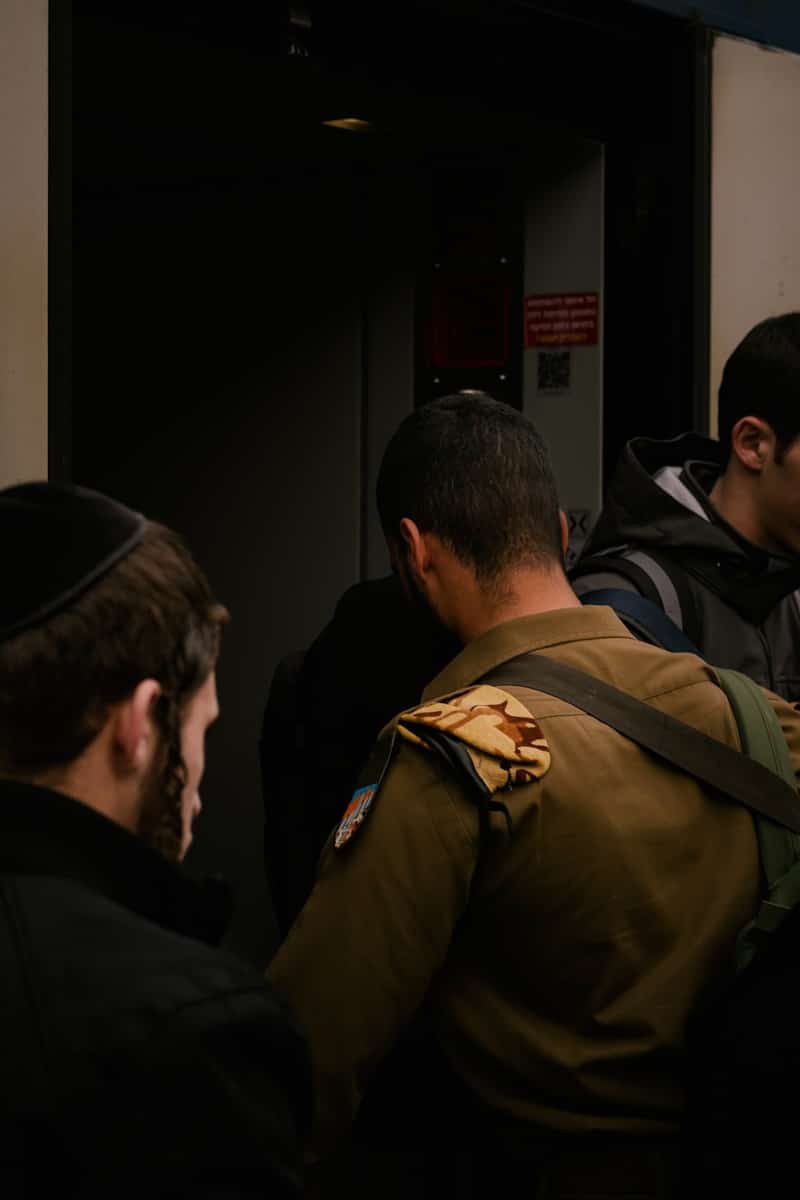 a group of men standing next to each other