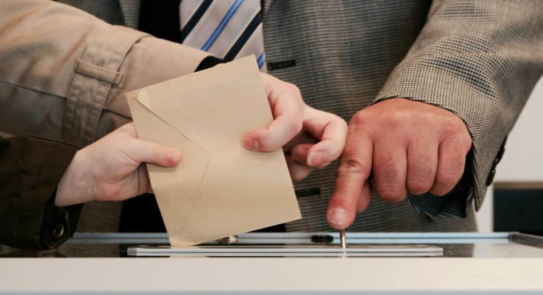 person standing near table