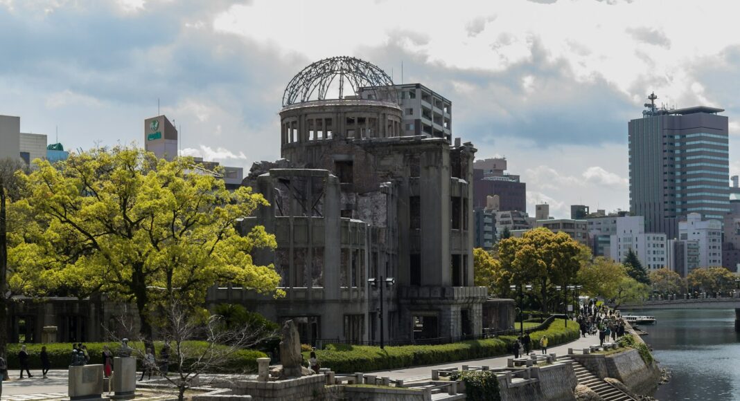 gray concrete building near body of water