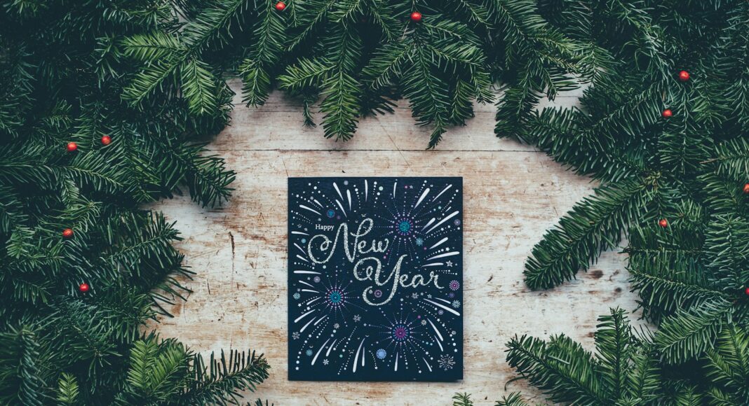 green Christmas decor with New Year greetings