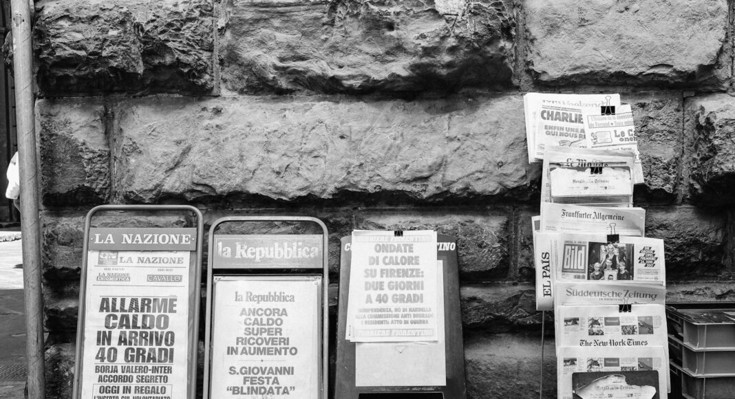 assorted signages in grayscale photography