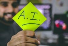 person holding green paper