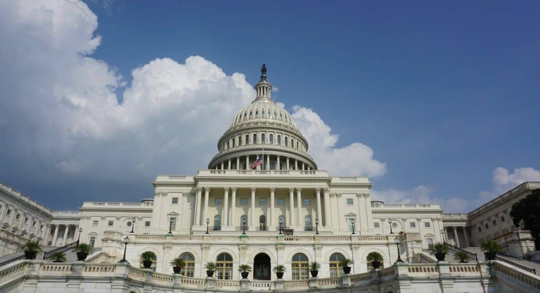 white concrete building under blue sky during daytime