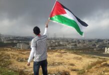 man waving flag
